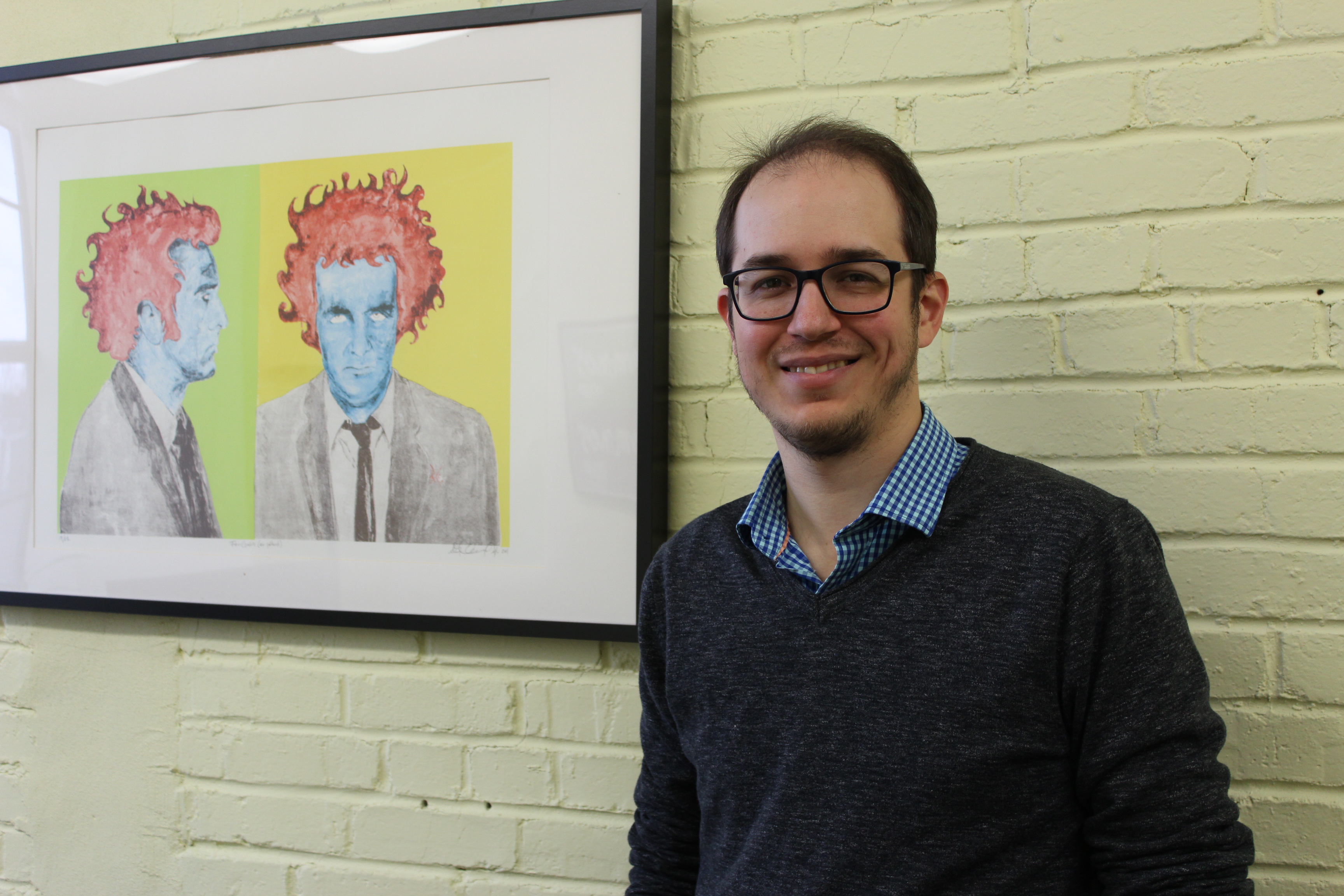 Une photo d'Alexandre Leduc dans son bureau.